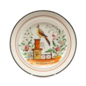 SWANSEA POTTERY PLATE, 1830-50, painted with an exotic bird perched on a pedestal between stylised