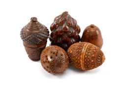 COLLECTION OF COQUILLA NUT TREEN, including nutmeg grater in form of an acorn, fenestrated pomanders