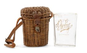 WICKER CASED VICHY SPA WATER BEAKER, oval fluted with rim, measure and title in gilt, in original