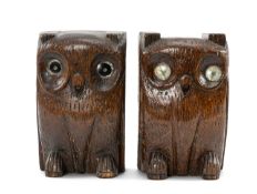 A PAIR OF TREEN OWL BOOKENDS, carved oak with inset glass eyes, 16cms (h) (2) Provenance: the Karl
