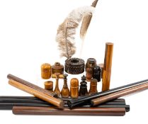 COLLECTION OF TREEN WRITING IMPLEMENTS, including travel inkwells, letter seals, inkwell, pen cases,