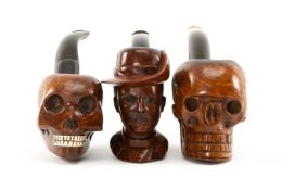 THREE NOVELTY TOBACCO PIPES including Baden-Powell and two skulls (3) Provenance: the Karl