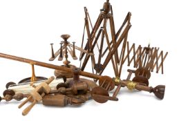 COLLECTION OF TREEN WOOL WINDERS, both with stands and table top fittings, one with brass arm