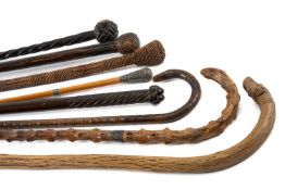 COLLECTION OF WALKING STICKS & RELATED TREEN, including an Irish wolfhound headed cane, Pewter