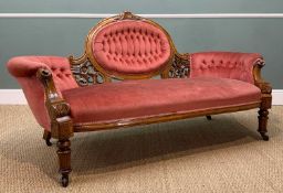 VICTORIAN WALNUT FRAMED SETTEE, oval back with pierced floral scrolling mounts, buttoned and pleated