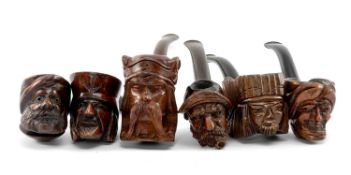 ASSORTED TOBACCO PIPES, carved with novelty heads and including a pirate, two Arab gentlemen, Indian