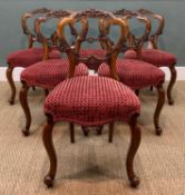 SIX VICTORIAN WALNUT BALLOON BACK DINING CHAIRS, foliate carved frames, serpentine seat, red check