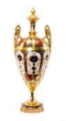 ROYAL CROWN DERBY '1128' PATTERN OVIFORM URN, with high scrolled twin foliate handles, on socle
