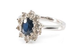 18CT. WHITE GOLD SAPPHIRE & DIAMOND CLUSTER RING, 4.1gms Provenance: private collection Cardiff