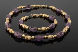 18CT GOLD & AMETHYST BEAD 'POBJOY MINT' NECKLACE & BRACELET, total gross weight 65gms (2)