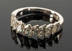 18CT GOLD DIAMOND HALF HOOP RING, set with nine marquise cut diamonds, each stone approx. 53 x