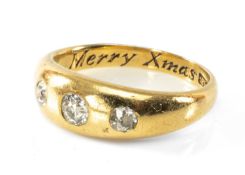 18CT GOLD THREE STONE DIAMOND RING, 0.4ct overall approx., engraved 'Merry Xmas '91', ring size Q,