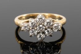 18CT GOLD NINE STONE DIAMOND CLUSTER RING, of lozenge design, each diamond 0.07ct approx., ring size