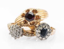 THREE 9CT GOLD GEM SET RINGS, comprising presumed garnet single stone ring (size Q), diamond cluster