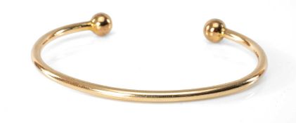 9CT YELLOW GOLD TORQUE BANGLE, 15.1gms Provenance: private collection Carmarthenshire Comments: