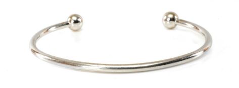 9CT WHITE GOLD TORQUE BANGLE, 13.7gms Provenance: private collection Carmarthenshire Comments: light