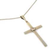 9CT WHITE GOLD DIAMOND SET CROSS PENDANT, the single stone measuring 0.2ct approx., on 9ct gold