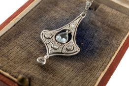 EARLY 20TH CENTURY WHITE METAL AQUAMARINE & DIAMOND PENDANT, of naturalistic form with central