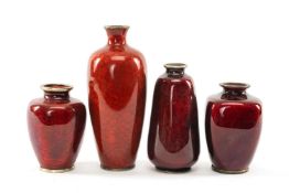 FOUR JAPANESE GINBARI ENAMEL BOTTLES, all with deep red glazes over foiled bases, largest 15cms (