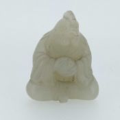 CHINESE PALE JADE ROOSTER HEAD ZODIAC FIGURE, late Qing Dynasty or later, seated in robes holding