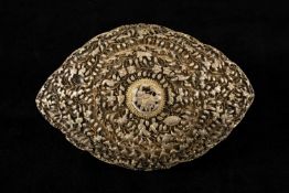PERANAKAN / STRAITS CHINESE SILVER GILT BELT BUCKLE of shaped oval form, decorated in high relief