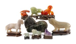 NINE VARIOUS CHINESE CARVED HARDSTONES, modelled as animals including Ming style recumbent horse,