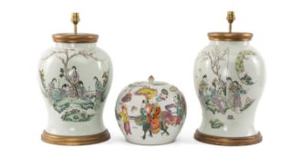 PAIR OF CHINESE FAMILLE ROSE BALUSTER VASES, 20th C., painted with Manchurian ladies in ornamental
