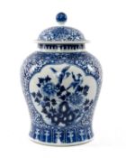 CHINESE BLUE & WHITE JAR & COVER, painted with two panels of birds and peony issuing from