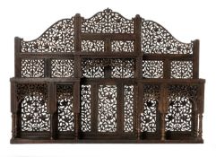 INDIAN CARVED HARDWOOD SHELF, probably Lahore, with mihrab shaped alcoves, turned columns and