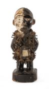 KONGO FETISH FIGURE, white/black painted face with inset glass eyes, body with rectangular charge