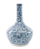 CHINESE BLUE & WHITE BOTTLE VASE, 19th C, of onion form, painted with flowers and meandering vines