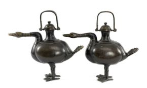 PAIR CHINESE BRONZE 'DUCK' EWERS & COVERS, each with waisted neck on bulbous bodies, with fan