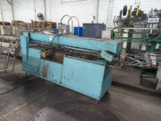 Mateer-Burt Rolling Can Labeler