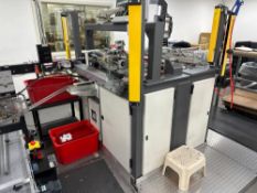 Kinematic SPC 5000 Strip Packer into 1.25” Diameter Vials