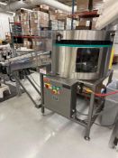 Hoppmann VFT302RLD Rotary Cap Dispenser with Gravity Roller Conveyor