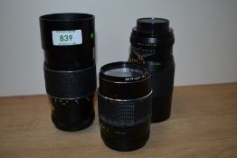 Three Chinon lenses. A 1:2,8 135mm and two Auto 1:3,5 200mm