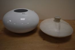 A modern ceramic planter or vase of bulbous form and a similar stylised example.