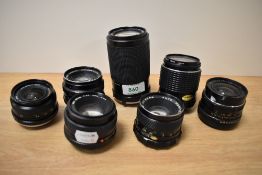 Seven Various lenses. An Exakta MC Macra 1:4,5-5,6 70-210mm, A Mamiya Sekor SX !:1,8 55mm, a Minolta