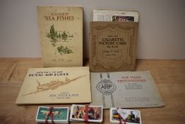 A small collection of cigarette cards relating to botany, birds and their young, and the RAF