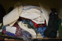A selection of vintage table linen, blouses, tights and similar.