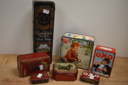 An assorted collection of 20th Century novelty advertising tins, including a Glenfiddich Pure Malt