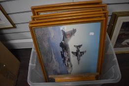 Eight glazed and framed photographic prints aircraft related.