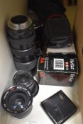 Three lenses. A Meyer Optic Gorlitz 3,5 30mm lens, a Soligar Macro Zoom 1:3,8 85-205mm lens and a