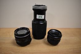 Three Vivitar lenses. A wide angle 1:2,8 28mm, a wide angle 1:2,8 35mm lens and a Macro Focusing