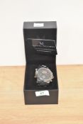 A gents Michael Philippe adventurer watch in box with guarantee card.