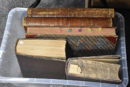 Three volumes of the London illustrated news, a dictionary and similar.