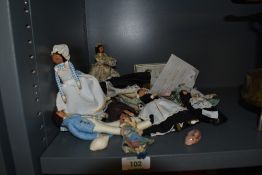 A small collection of mid-20th Century dolls, crafted by the artist Patience Arnold, the largest