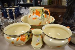 An Art Deco Myott, Son and Co wash stand jug and basin, two chamber pots and a tooth brush holder.