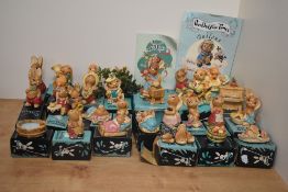 A collection of twenty two Pendelfin hand-painted Stonecraft anthropomorphic rabbit figures, various