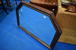 A modern over mantel wall mirror